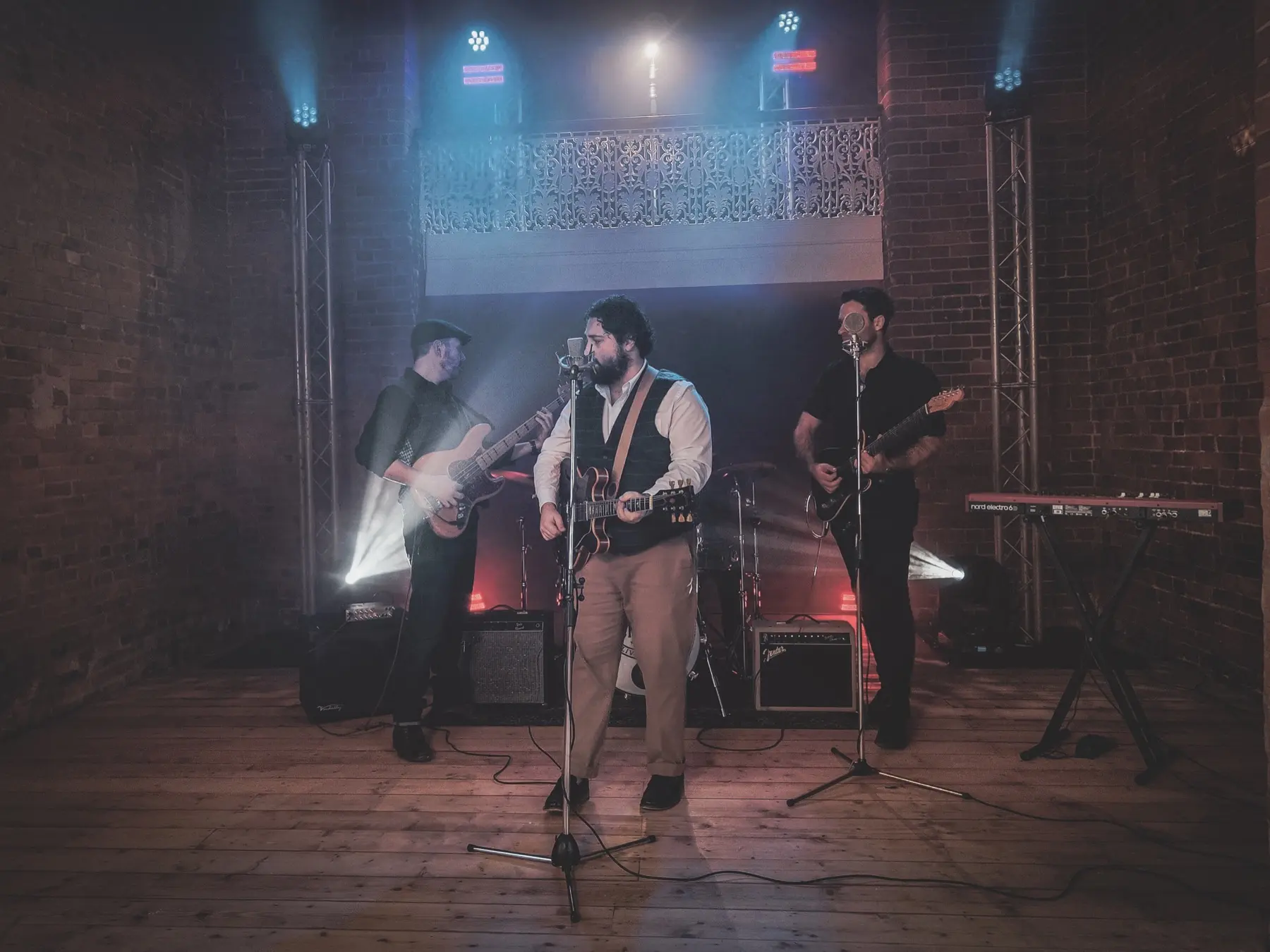 Live band performing with Show Pro stage lighting